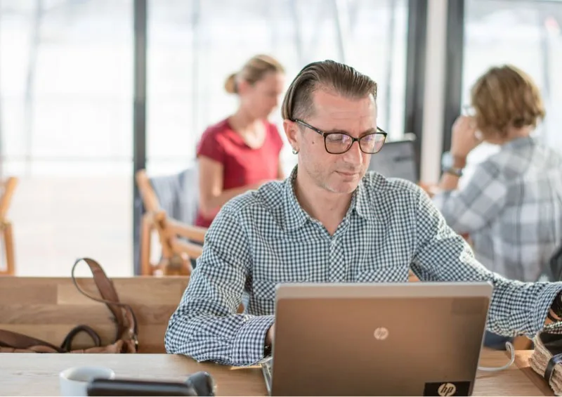 Developer working on a laptop in the office